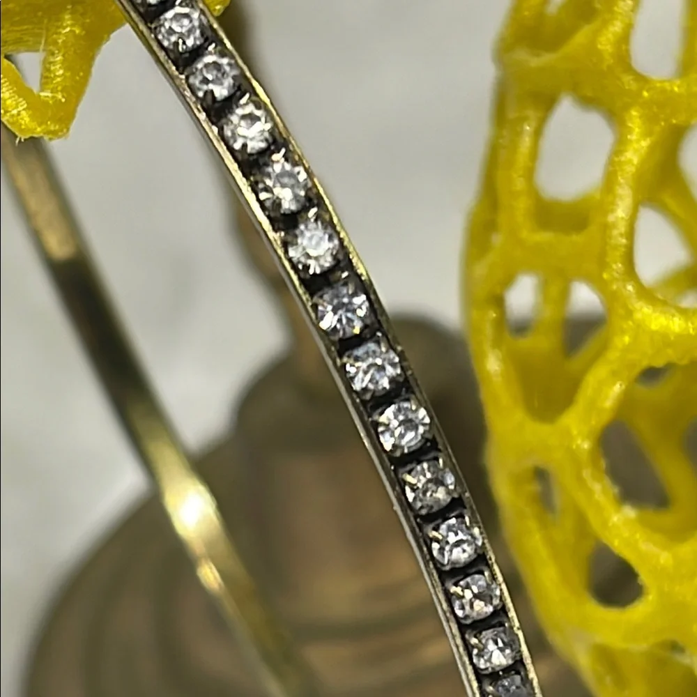 Elegant Gold tone and clear rhinestone Bangle Bracelet